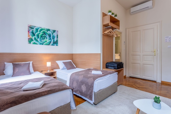 Imagen de la habitación del Hotel Booking BnB. Foto 7