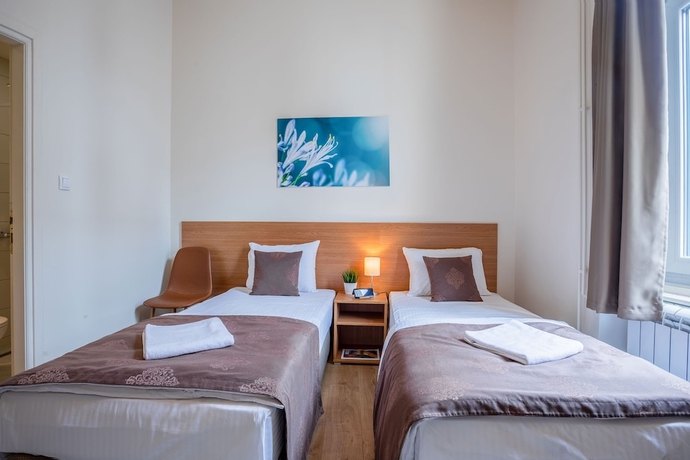 Imagen de la habitación del Hotel Booking BnB. Foto 16