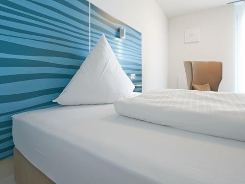 Imagen de la habitación del Hotel Book-it G&auml;steh&auml;user East Apart. Foto 10