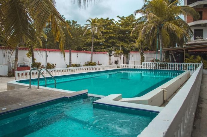 Imagen de la piscina del Hotel Boquilla Suites By Geh Suites. Foto 16