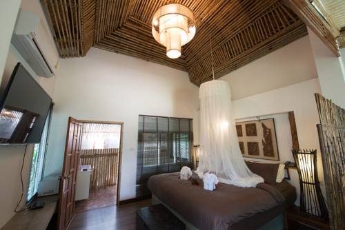 Imagen de la habitación del Hotel Bora Bora Villa Phuket. Foto 15