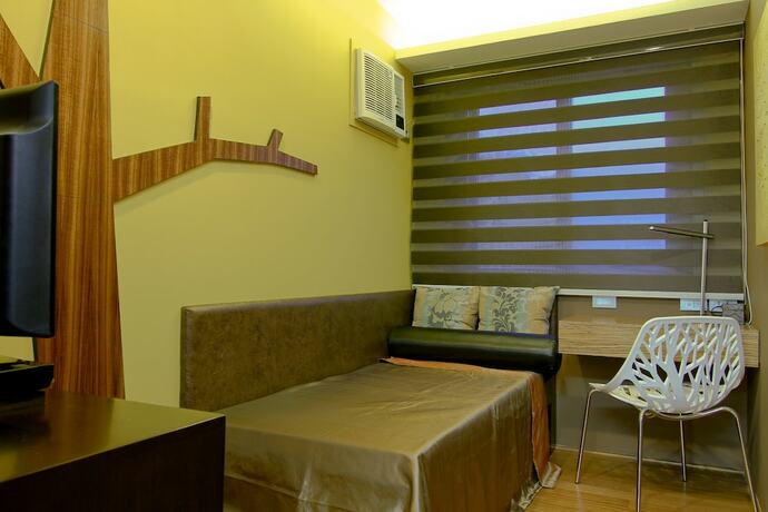 Imagen de la habitación del Hotel Boracay Suites. Foto 15