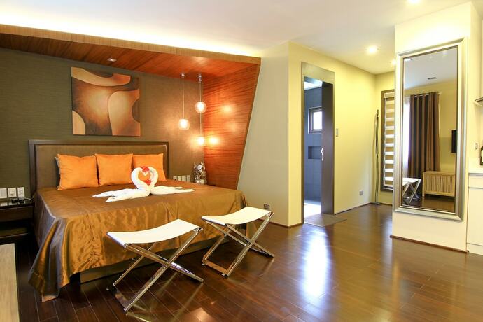 Imagen de la habitación del Hotel Boracay Suites. Foto 18
