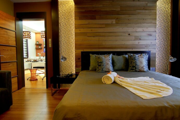 Imagen de la habitación del Hotel Boracay Suites. Foto 19