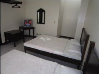 Imagen de la habitación del Hotel Boracay Travelodge Beach Resort. Foto 12
