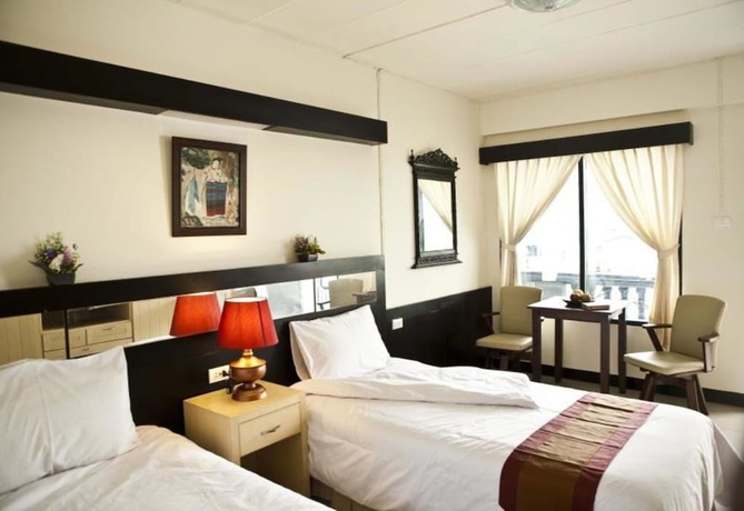 Imagen de la habitación del Hotel Borarn House. Foto 4