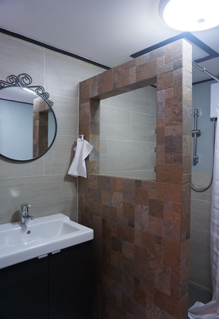Imagen de la habitación del Hotel Borarn House. Foto 15