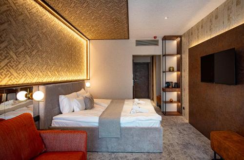 Imagen de la habitación del Hotel Bordűr Wellness Superior &eacute;s Szőnyegm&uacute;zeum. Foto 11