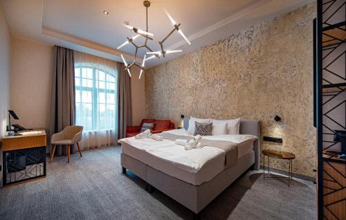 Imagen de la habitación del Hotel Bordűr Wellness Superior &eacute;s Szőnyegm&uacute;zeum. Foto 12