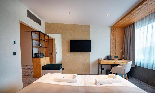 Imagen de la habitación del Hotel Bordűr Wellness Superior &eacute;s Szőnyegm&uacute;zeum. Foto 14