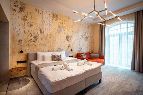 Imagen de la habitación del Hotel Bordűr Wellness Superior &eacute;s Szőnyegm&uacute;zeum. Foto 15