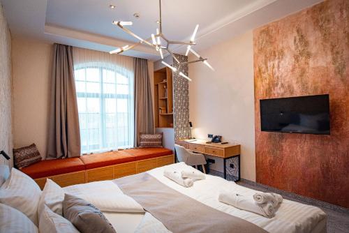 Imagen de la habitación del Hotel Bordűr Wellness Superior &eacute;s Szőnyegm&uacute;zeum. Foto 16