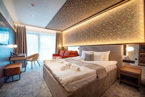 Imagen de la habitación del Hotel Bordűr Wellness Superior &eacute;s Szőnyegm&uacute;zeum. Foto 19