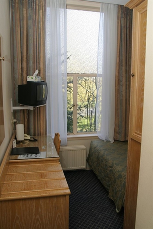 Imagen de la habitación del Hotel Borgmann Villa Hotel. Foto 7