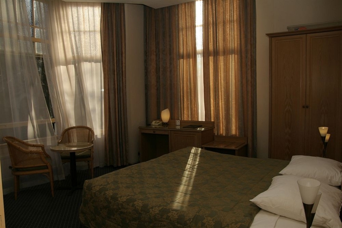 Imagen de la habitación del Hotel Borgmann Villa Hotel. Foto 8