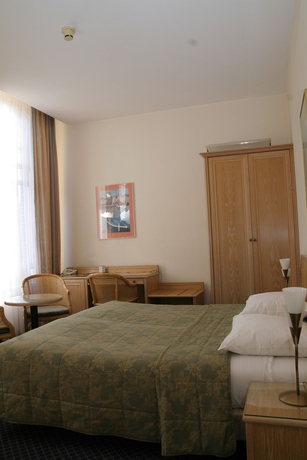 Imagen de la habitación del Hotel Borgmann Villa Hotel. Foto 11