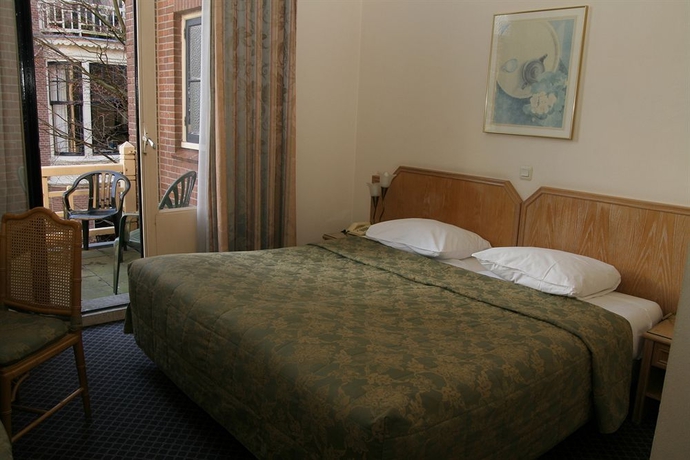 Imagen de la habitación del Hotel Borgmann Villa Hotel. Foto 12