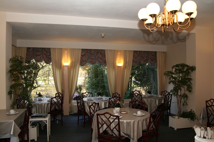 Imagen del bar/restaurante del Hotel Borgmann Villa Hotel. Foto 6