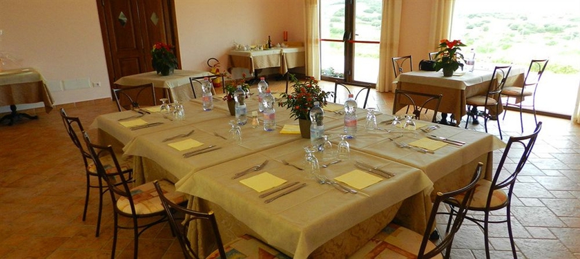 Imagen del bar/restaurante del Hotel Borgo Alba Barona Turismo Rurale. Foto 3