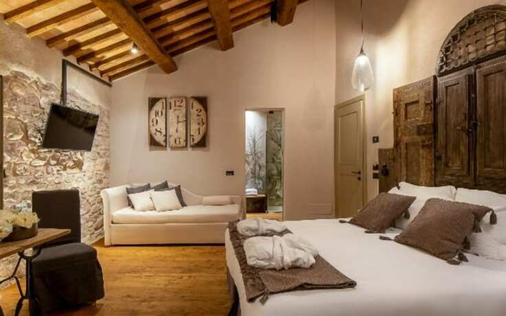 Imagen de la habitación del Hotel Borgo Antichi Orti Assisi. Foto 17