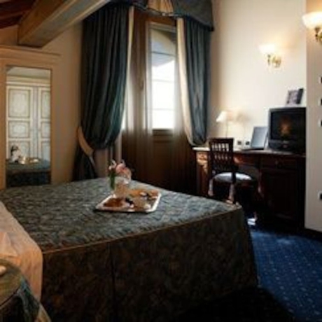 Imagen de la habitación del Hotel Borgo Ca' Dei Sospiri. Foto 5