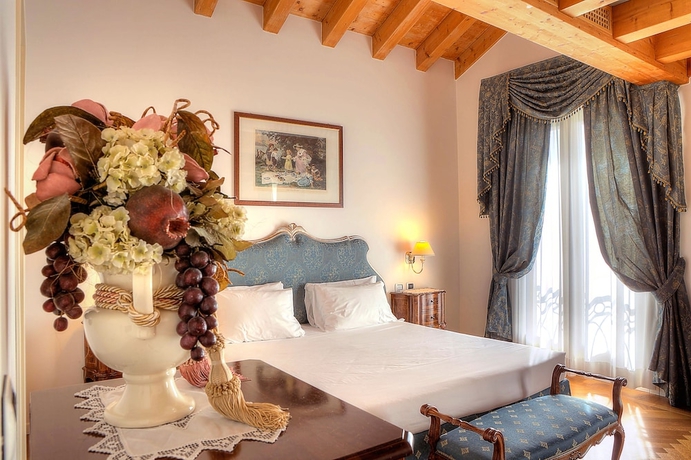 Imagen de la habitación del Hotel Borgo Ca' Dei Sospiri. Foto 9