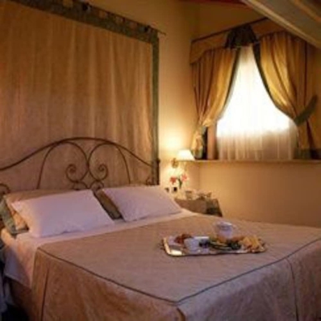 Imagen de la habitación del Hotel Borgo Ca' Dei Sospiri. Foto 15