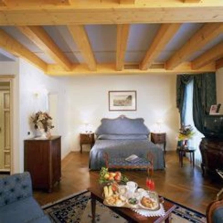Imagen de la habitación del Hotel Borgo Ca' Dei Sospiri. Foto 16