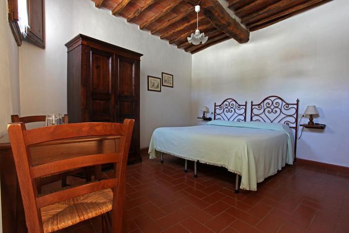 Imagen de la habitación del Hotel Borgo Castelvecchi. Foto 15