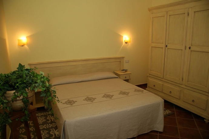 Imagen de la habitación del Hotel Borgo Degli Ulivi Residence. Foto 3