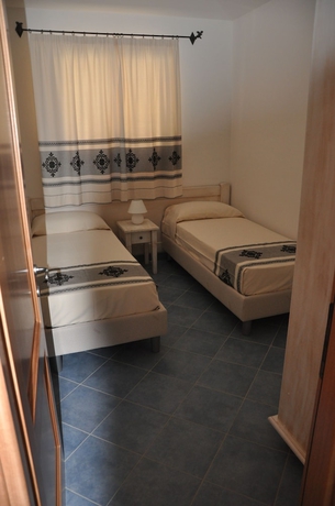 Imagen de la habitación del Hotel Borgo Degli Ulivi Residence. Foto 8
