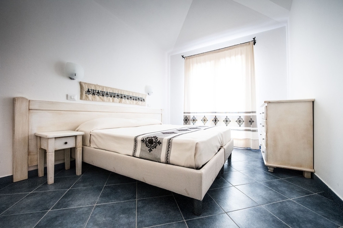 Imagen de la habitación del Hotel Borgo Degli Ulivi Residence. Foto 9