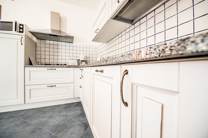 Imagen de la habitación del Hotel Borgo Degli Ulivi Residence. Foto 10