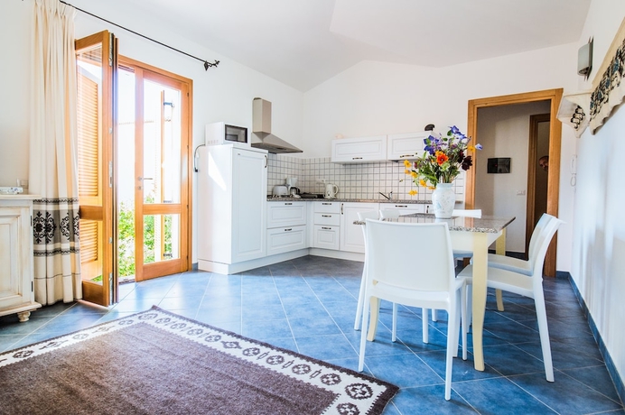 Imagen de la habitación del Hotel Borgo Degli Ulivi Residence. Foto 11