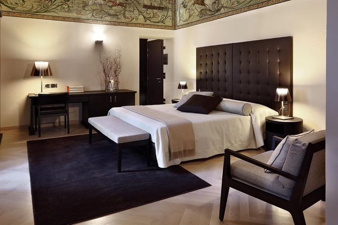 Imagen de la habitación del Hotel Borgo Dei Conti Resort Relais and Chateaux. Foto 1