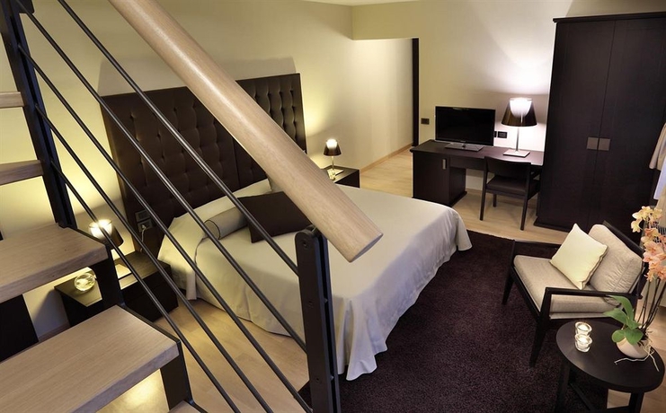 Imagen de la habitación del Hotel Borgo Dei Conti Resort Relais and Chateaux. Foto 4