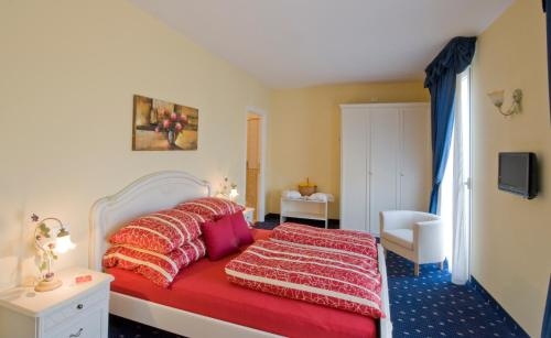 Imagen de la habitación del Hotel Borgo Dei Poeti Wellness Resort. Foto 7