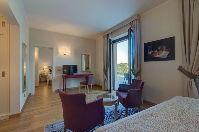 Imagen de la habitación del Hotel Borgo La Chiaracia Resort and SPA. Foto 14