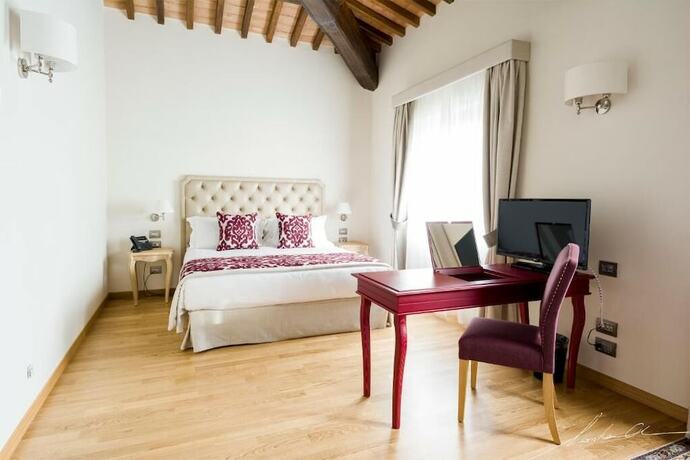 Imagen de la habitación del Hotel Borgo La Chiaracia Resort and SPA. Foto 17