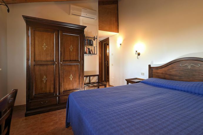 Imagen de la habitación del Hotel Borgo Magliano Resort. Foto 6