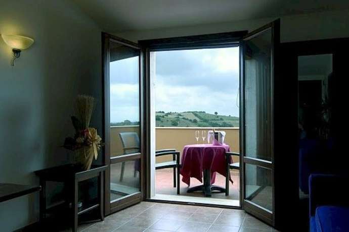 Imagen de la habitación del Hotel Borgo Magliano Resort. Foto 13