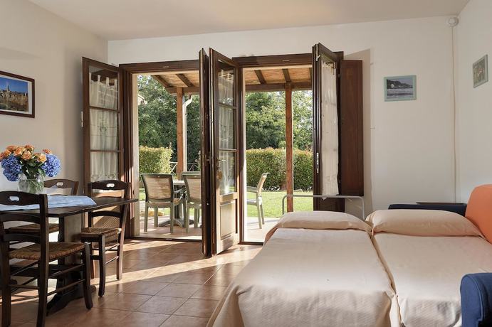 Imagen de la habitación del Hotel Borgo Magliano Resort. Foto 14