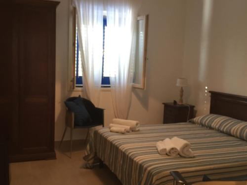 Imagen de la habitación del Hotel Borgo Marino Aparthotel. Foto 10