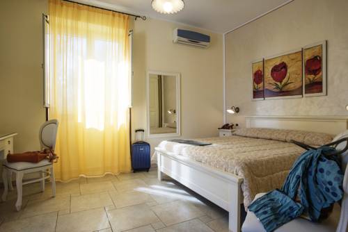 Imagen de la habitación del Hotel Borgo Mulino A Vento - Resort. Foto 10