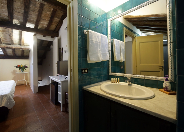 Imagen de la habitación del Hotel Borgo Pio Suites Inn. Foto 2