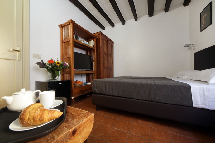 Imagen de la habitación del Hotel Borgo Pio Suites Inn. Foto 5