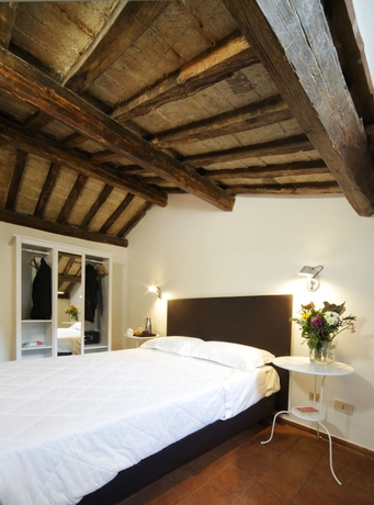 Imagen de la habitación del Hotel Borgo Pio Suites Inn. Foto 6