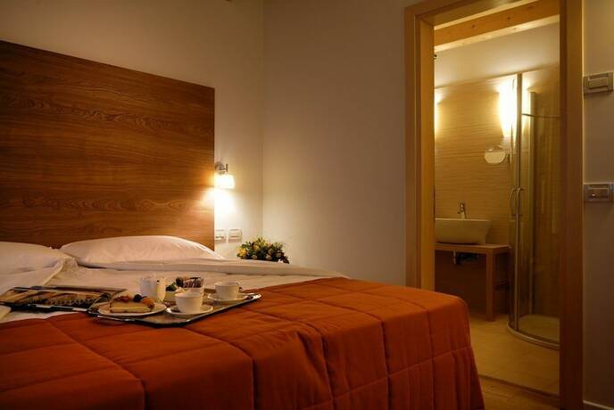 Imagen de la habitación del Hotel Borgo Ronchetto Relais Gourmet. Foto 11