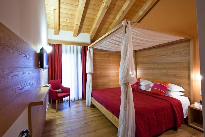 Imagen de la habitación del Hotel Borgo Ronchetto Relais Gourmet. Foto 12