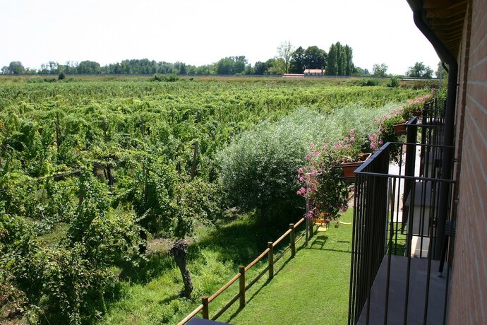 Imagen de la habitación del Hotel Borgo Ronchetto Relais Gourmet. Foto 14